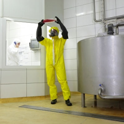 Image of employee checking product for chemicals