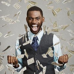 Exaggerated picture of employee being rewarded with money falling from the sky. 