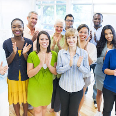 Employees celebrating another employees safety behavior.