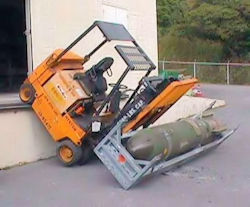 Image showing forklift that has fallen off a loading dock