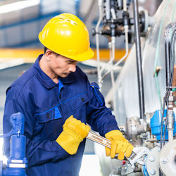 employee working around mechanical hazards