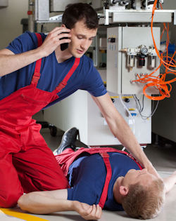 employee checking on coworker after accident