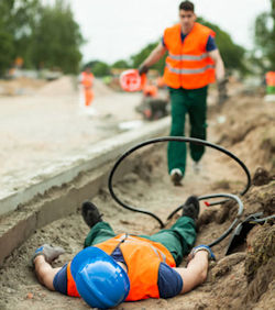 Worker laying in ditch injured by electrocution