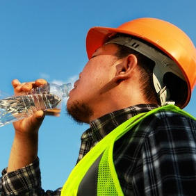 Worker drinking water