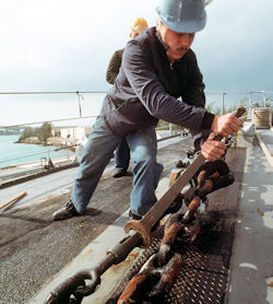 Worker tightening turnbuckle