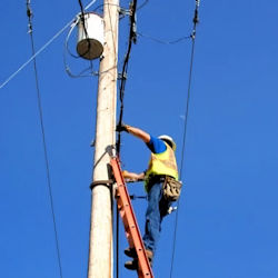 Image working on ladder - usace photo