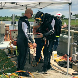 USACE divers preparing to enter the water IAW the Diver Operations Plan.