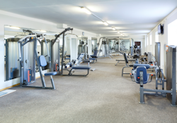 large weight room filled with equipment