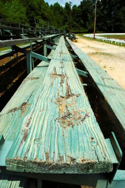 Wooden outdoor bleachers in poor condition