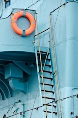 stairs on a ship that are very steep and look like ladders.