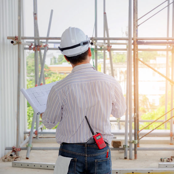 Competent person inspecting scaffold.