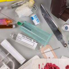 mixture of healtcare items placed in trash that could expose workers to contamination