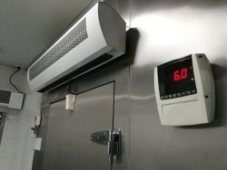 Freezer door and thermometer.