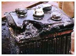  a damaged battery by sulfuric acid