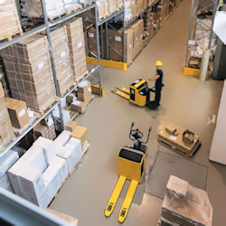 two forklifts traveling in a warehouse showing travel patterns