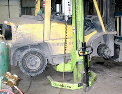 This raised forklift has stored potential energy which can be dangerous