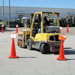 Forklift operator in training showing driving skills and abilities