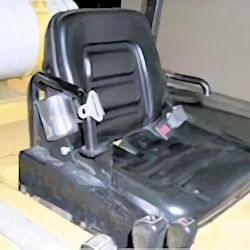 operator seat includes a seat belt