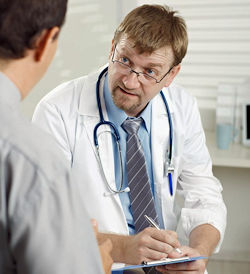 A doctor speaking with a patient.