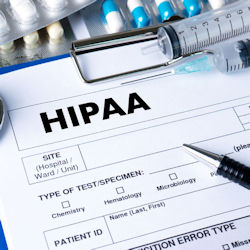 A form with the letters HIPAA written on it with a pen.