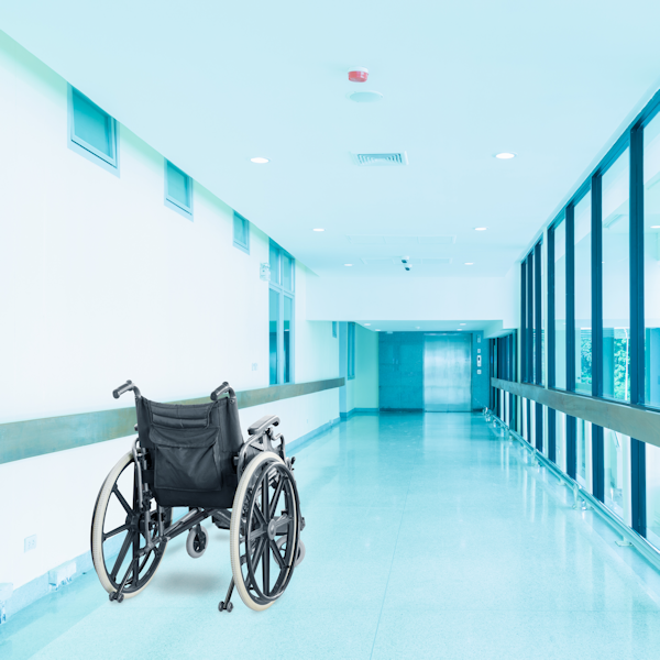 Wheel chair in a hallway.