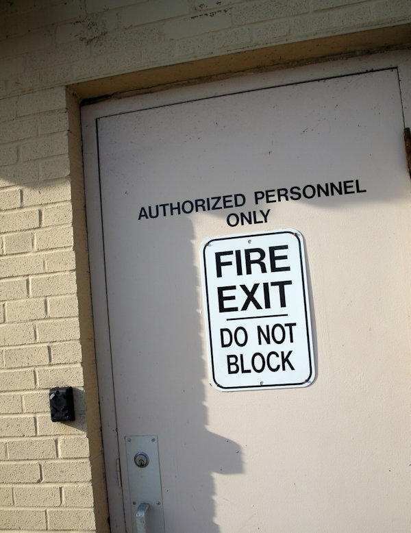 Sign on outside door showing Fire Exit