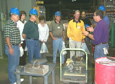 Image showing a trainer conducting training to a group of employees