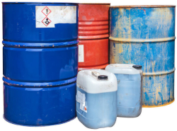 barrels and plastic containers containing hazardous materials