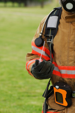 Firefighter using personal air monitor