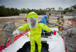 Workers being decontaminated