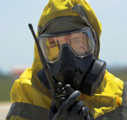 worker talking into a two-way radio