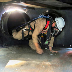 confined space entrant wearing respiratory protection