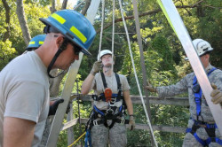 A confined space entry team about to enter a confined space