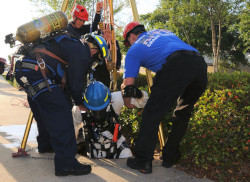 Confined space rescue team members responding to emergency