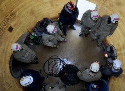 Workers inside a confined space