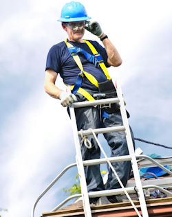 man at the top of a ladder