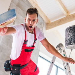 Image of worker falling off a ladder