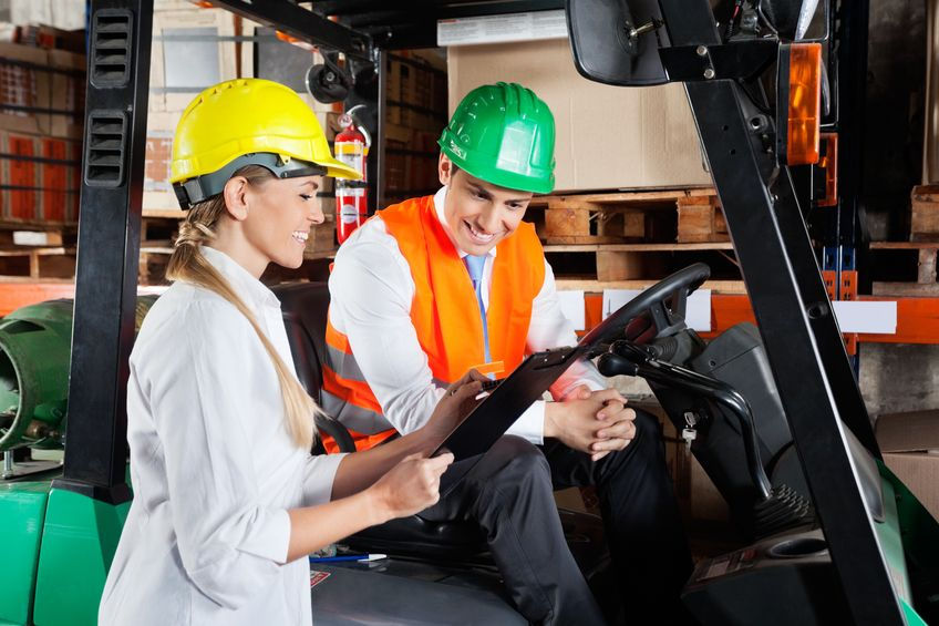 Employee observing a forklift driver