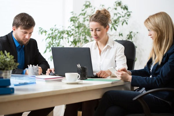 Employees reviwing results of an inspection