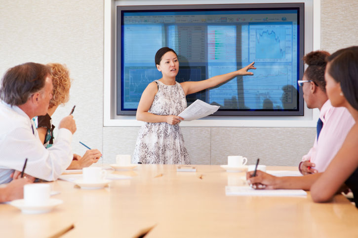 Employee giving a presentation to a group