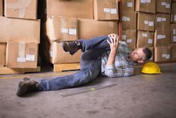 Employ on floor with knee injury