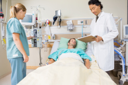 Image of patient/doctors in room