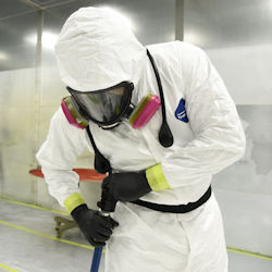 Worker wearing protective clothing and ppe