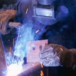 worker wearing a face shield