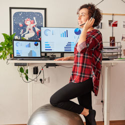 Worker using a stability ball instead of a chair.