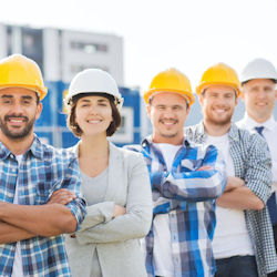 Happy employees standing in a row