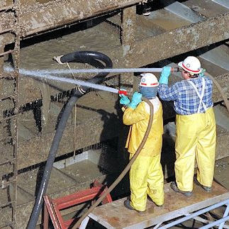 workers cleaning structure