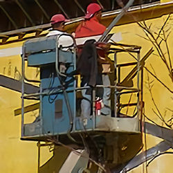 worker on articulating manlift