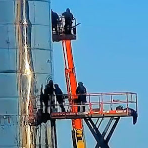 Scissor lift and articulating platforms with four workers.