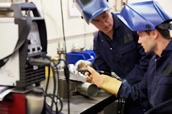 Employee receiving welding training